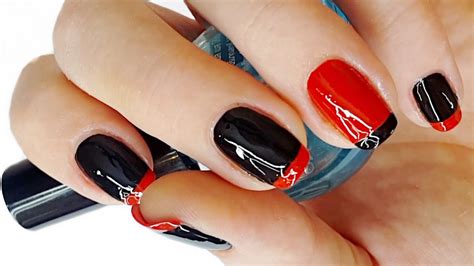 red nails black tips